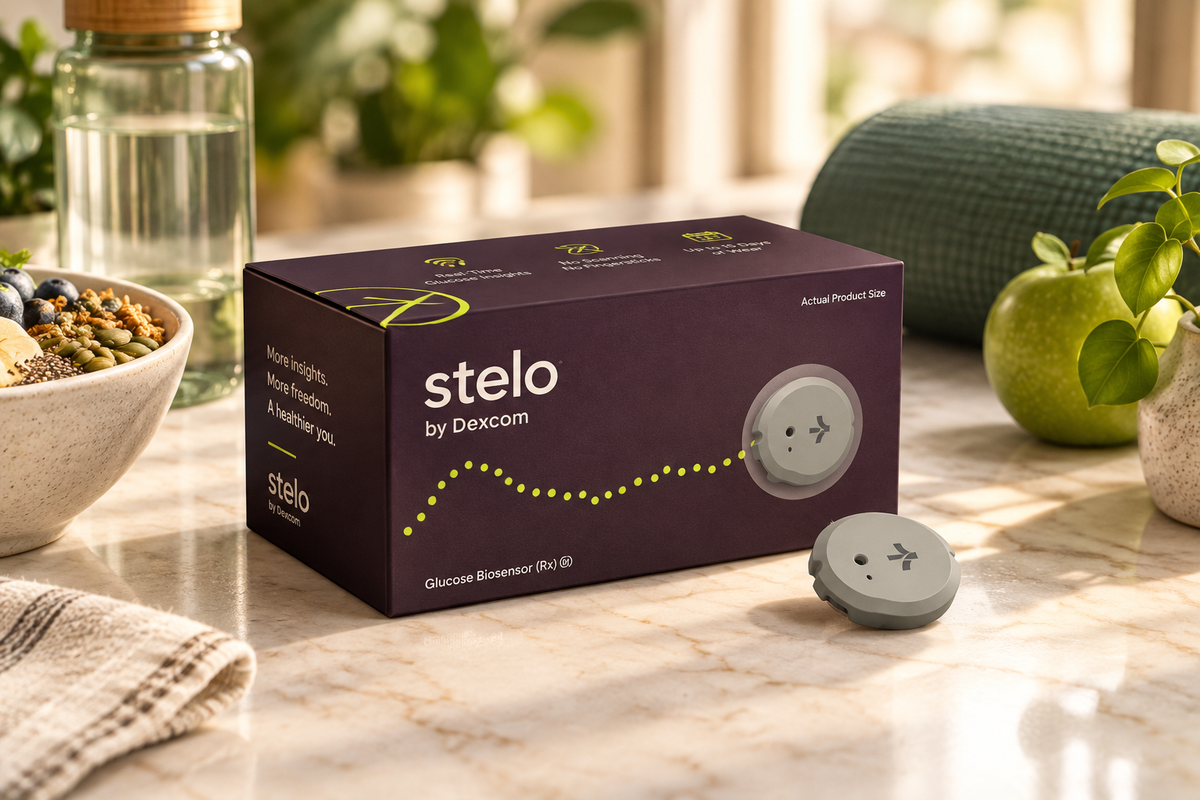 Dexcom Stelo box and sensor flat lay on marble surface