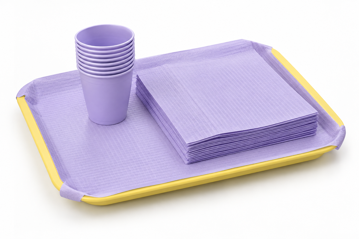 Lavender dental tray cover on Ritter B yellow tray with cups and bibs